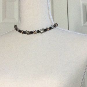 Multi-colored crystal and rhinestone necklace on silver chain